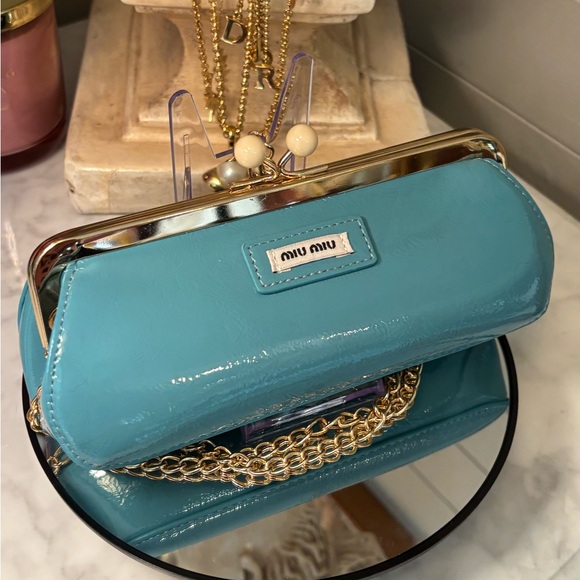 Miu Miu Handbags - Miu Miu Turquoise Patent Leather kiss lock Clutch with crossbody strap NIB